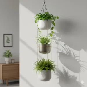 A space-saving vertical indoor garden featuring three contemporary hanging planters arranged in a row.