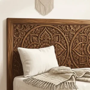 Close-up of a hand-carved mango wood headboard available in our boho furniture for sale catalog.